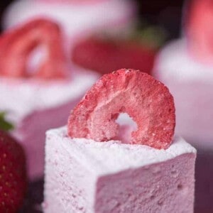 a close up of a marshmallow with a freeze dried strawberry in it