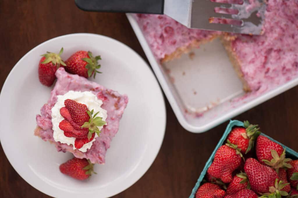 Strawberry Poke Cake with whipped cream