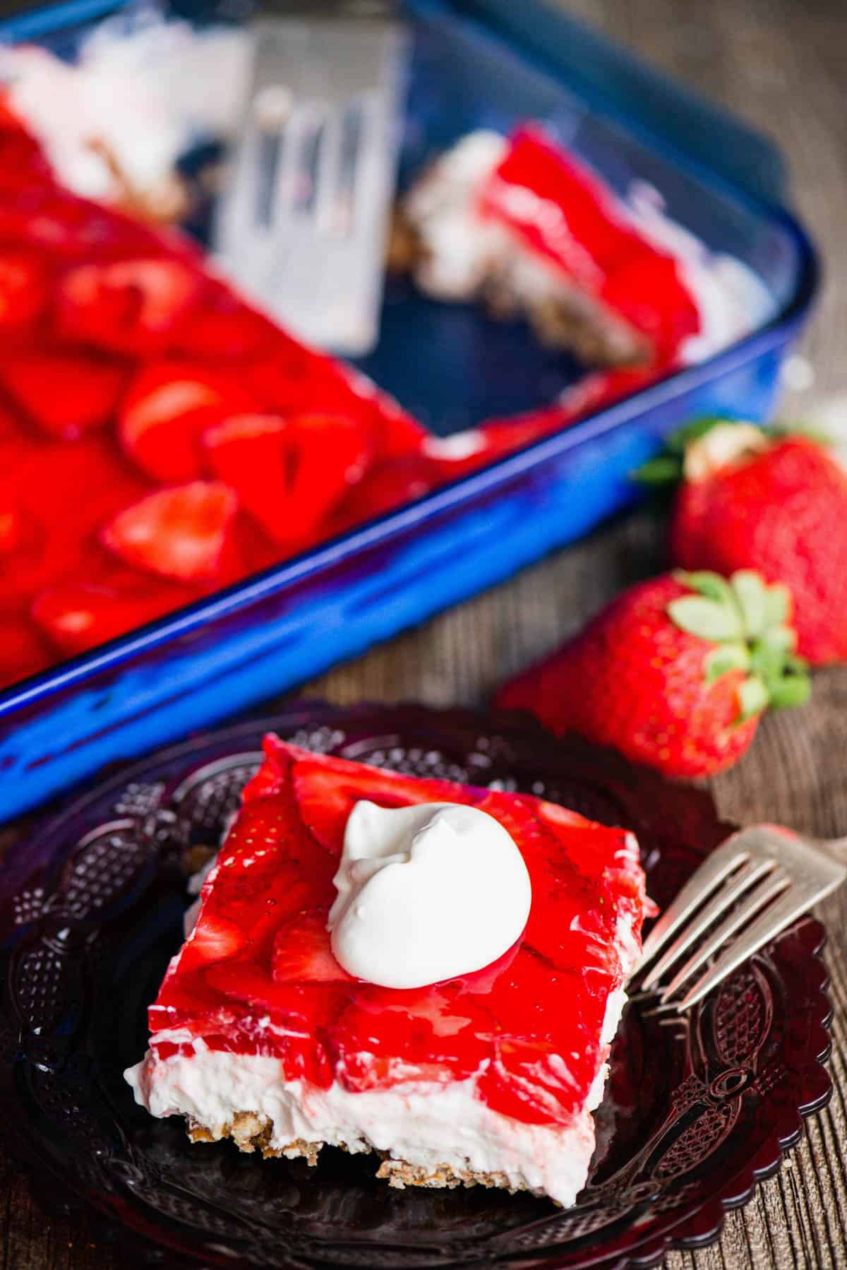 the best homemade strawberry pretzel dessert recipe with real whipped cream.
