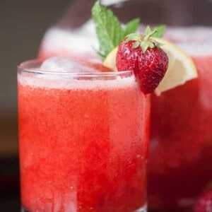 This perfectly sweet and equally tart fresh squeezed Strawberry Rhubarb Lemonade is the ultimate kid friendly summer drink and will quench any thirst.