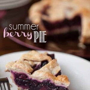 a slice of summer berry pie on a plate