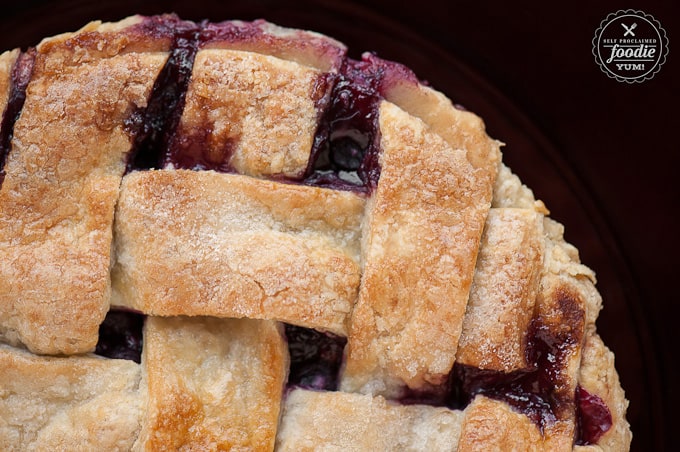 looking down at a summer berry pie with a lattice crust