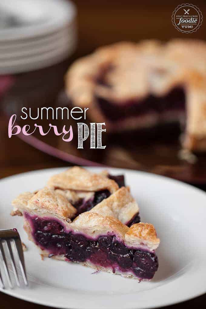 a slice of summer berry pie on a plate