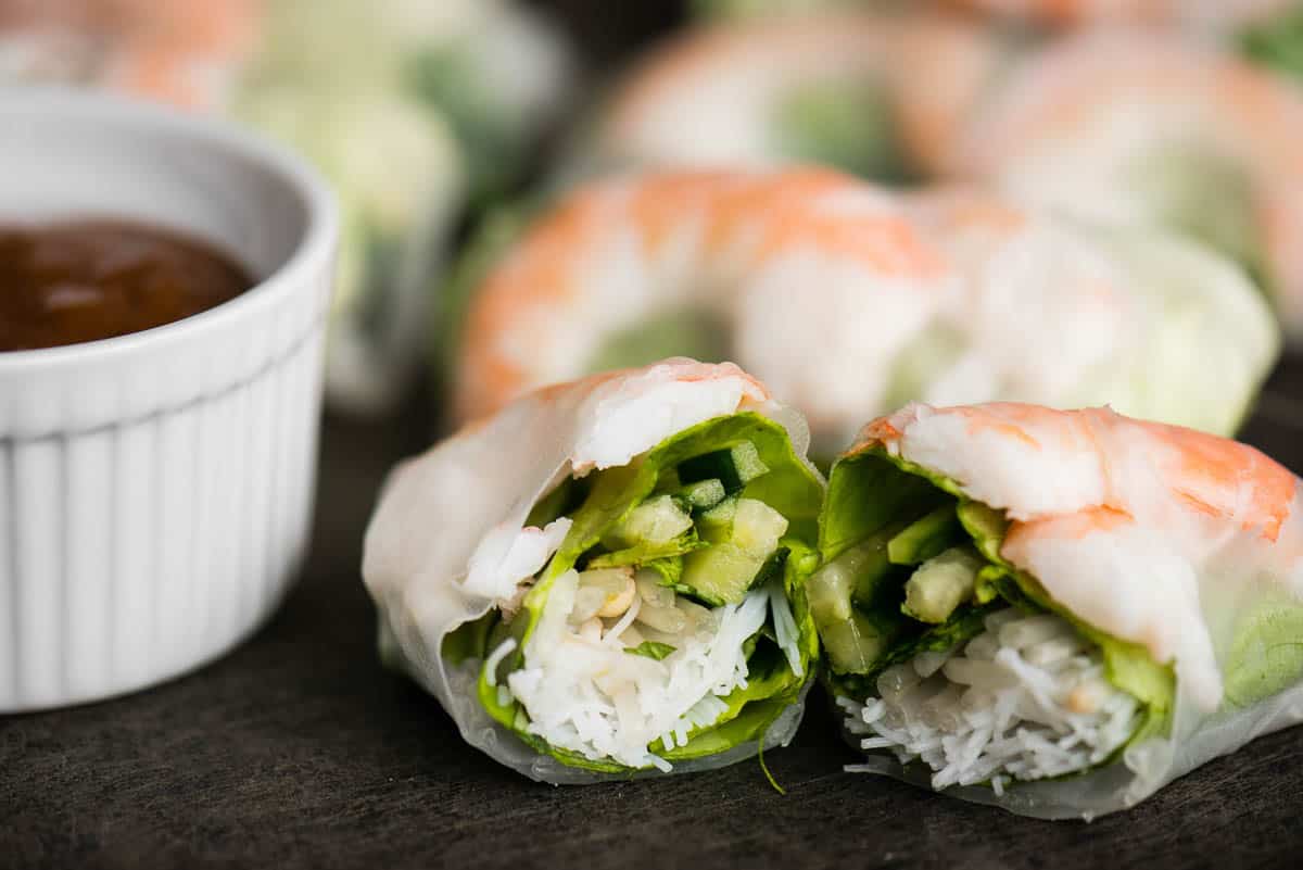 homemade summer roll cut in half.