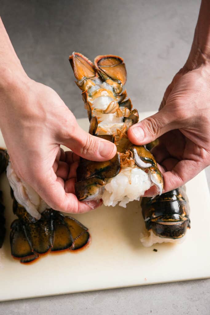 separating lobster tail meat from shell