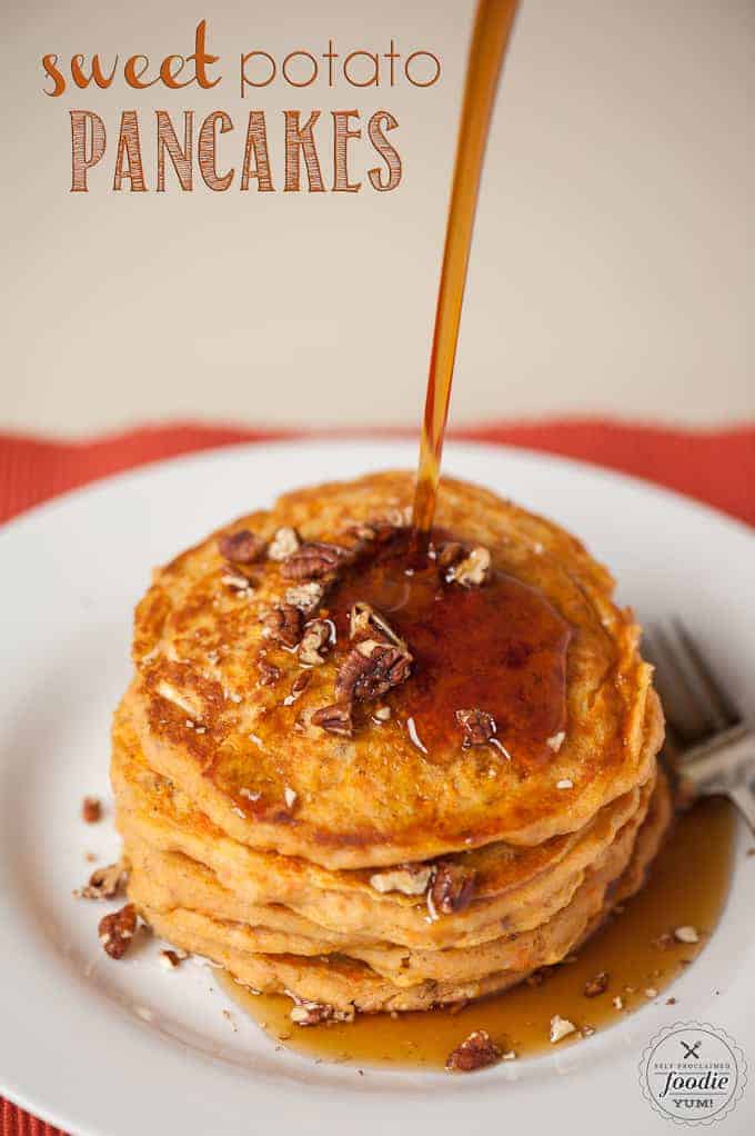 sweet potato pancakes with syrup being poured onto it