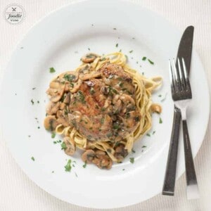 Ready in just 30 minutes, Tender Pork Marsala made with marinated pork tenderloin smothered in a mushroom wine sauce, is perfect for any night of the week.