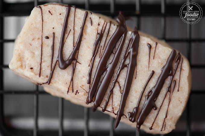 a close up of a chocolate coconut cookie