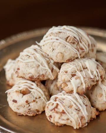 These Toasted Macadamia Coconut Cookies with a white chocolate drizzle cook perfectly every time and are full of nutty flavor.
