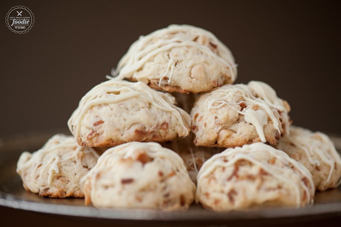 a pile of toasted macadamia coconut cookies