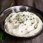Two-Ingredient Cauliflower Mash is a quick, easy, healthy, low carb side dish that is so rich and delicious that you might actually mistake the flavorful cauliflower for creamy mashed potatoes!