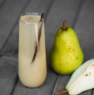 Vanilla Pear Prosecco, made with fresh pears, whole vanilla beans, and a crisp bubbly Prosecco, is the perfect fall and winter holiday cocktail!