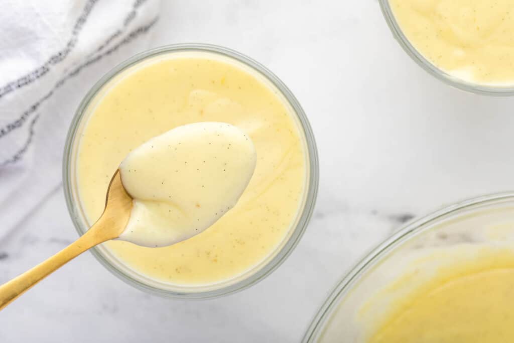 homemade vanilla pudding on spoon