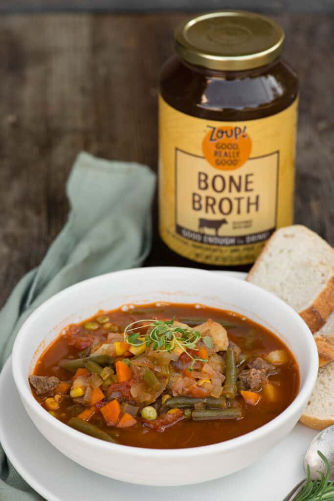 vegetable beef soup and bottle of beef broth