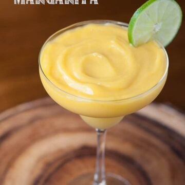 This non-alcoholic kid friendly Virgin Mango Lime Margarita takes only minutes to make and is full of tangy sweet fruit that blends up perfectly smooth.