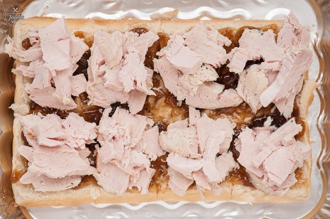 sliced turkey on open faced sandwiches