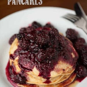 Homemade Whole Wheat Buttermilk Pancakes topped with berries