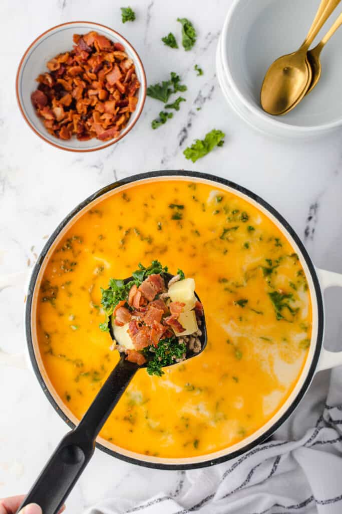 ladle of Zuppa Toscana soup