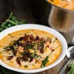 Zuppa Toscana is a hearty creamy homemade soup made with spicy Italian sausage, potatoes and baby kale. This tasty Zuppa Toscana soup recipe is a copycat version of what you would find at The Olive Garden.